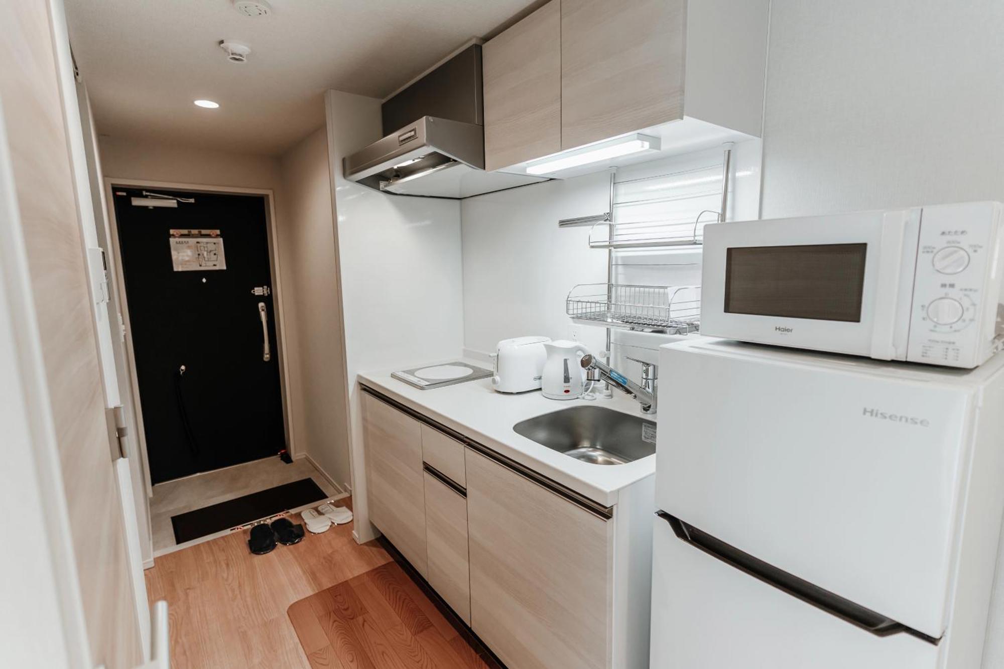 Shinkou House Ue Apartment Osaka Bagian luar foto